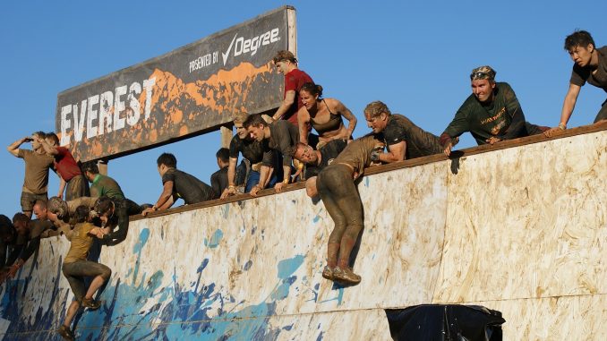 Obstacle course race camaraderie