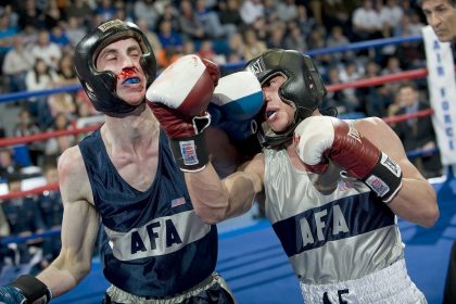 Boxing match with bloody nose